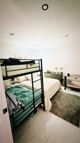 a view of a balcony with chairs