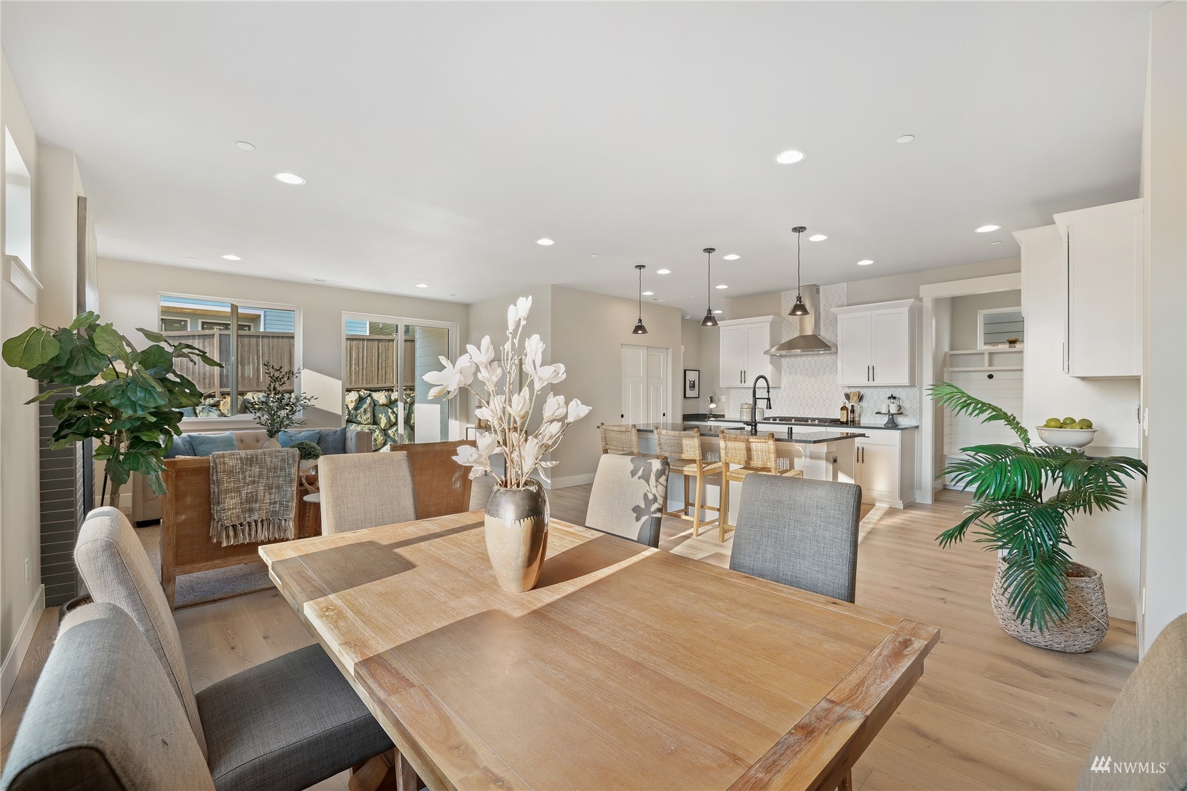 4325 244th Street Southeast, Unit LOT36 Bothell, WA 98021 - Photo 17 of 38 a view of a dining room with furniture and wooden floor