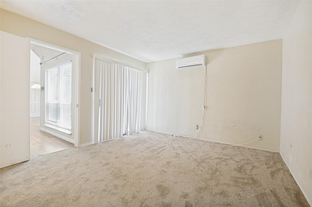 7305 Pineberry Road Dallas, TX 75249 - Photo 17 of 25 a view of an empty room