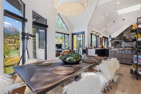 a view of a workspace with a large window