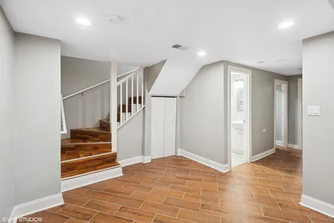a view of entryway with wooden floor