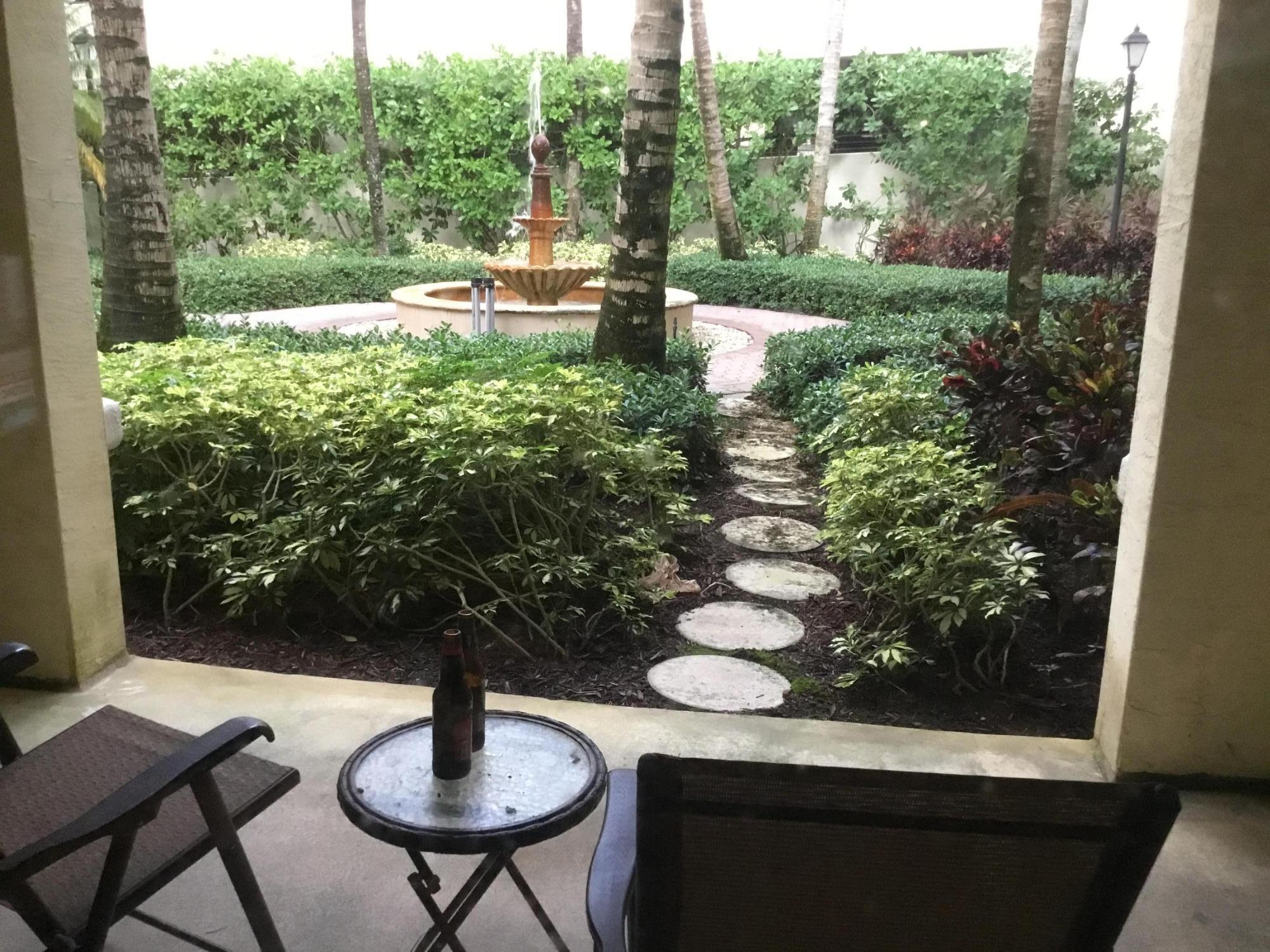 3111 Renaissance Way, Unit 111 Boynton Beach, FL 33426 - Photo 8 of 20 a view of swimming pool from a balcony