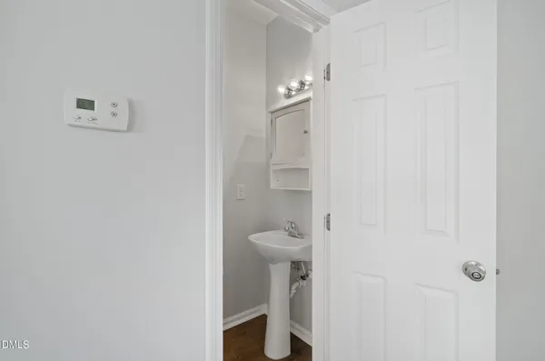 a bathroom with a sink and toilet