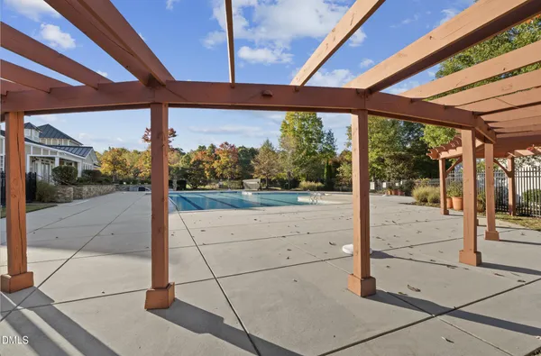 a view of a park with large trees