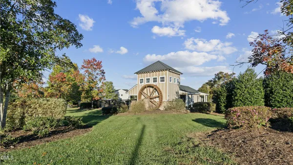a view of a park with swings and slides