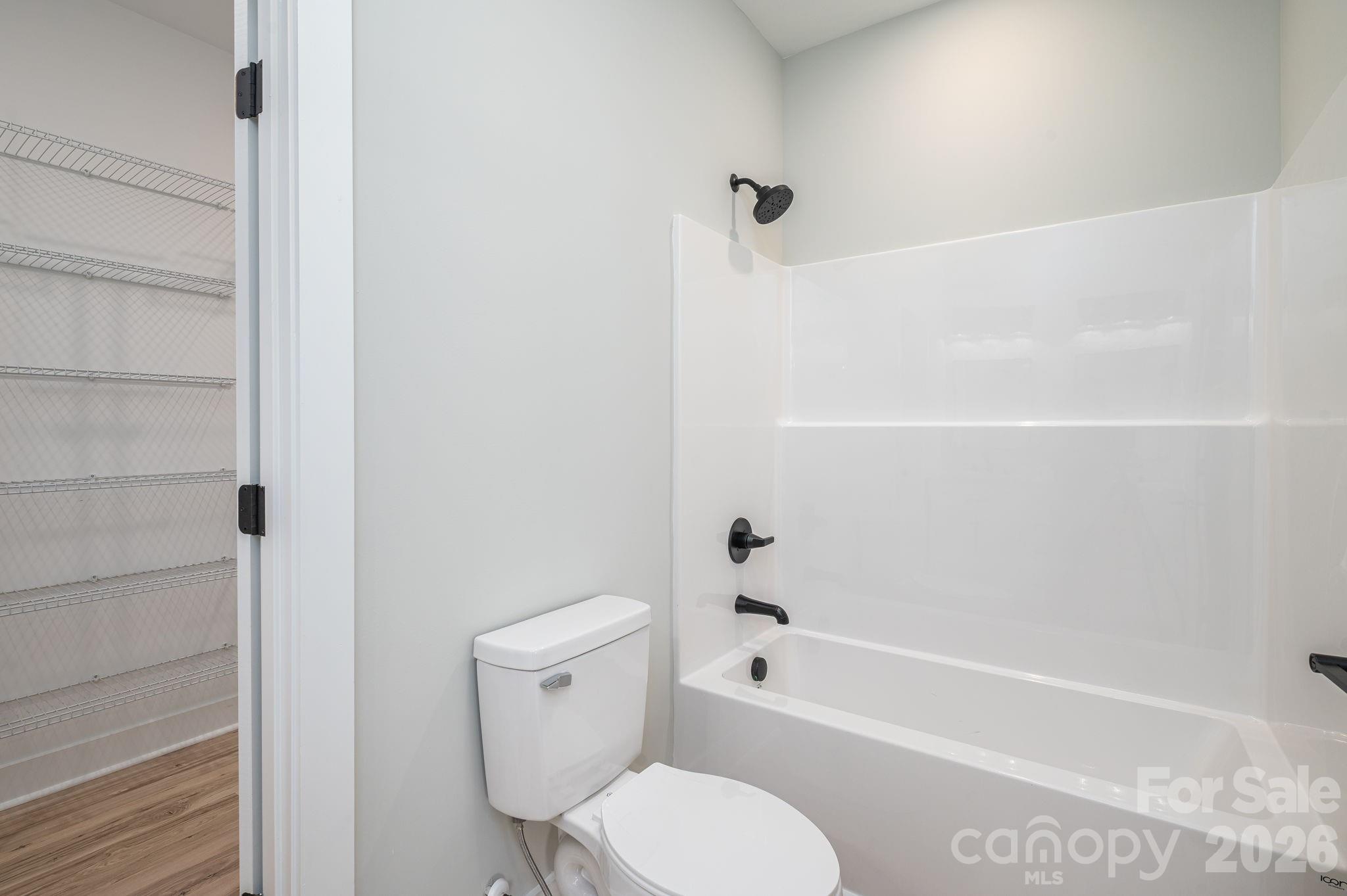 2474 Shoal Road Crouse, NC 28033 - Photo 24 of 39 a bathroom with a toilet and a bathtub