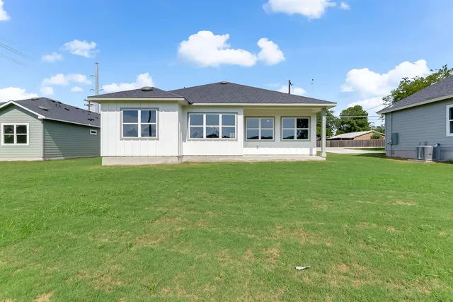 a view of a workspace with furniture