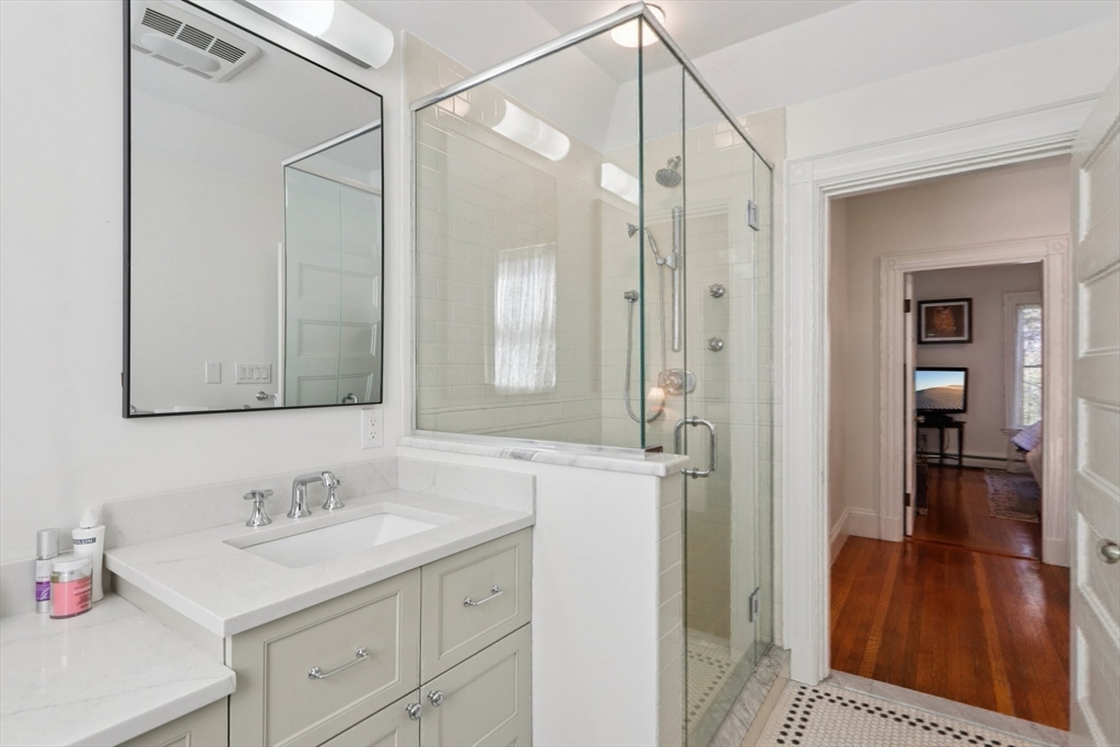 35 Frances Street Melrose, MA 02176 - Photo 19 of 42 a bathroom with a sink and a mirror