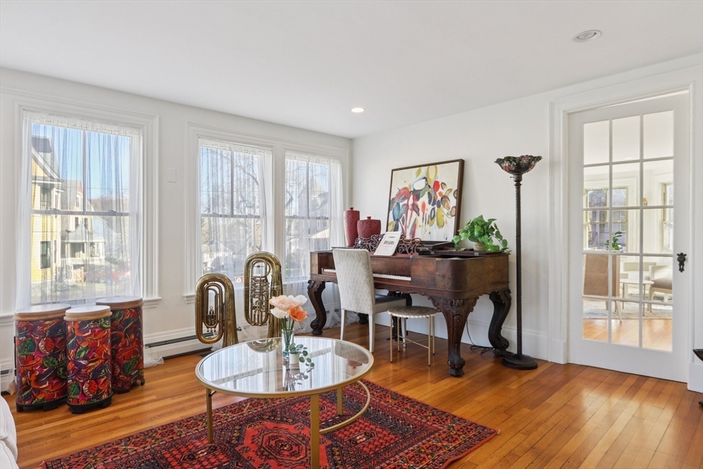 35 Frances Street Melrose, MA 02176 - Photo 6 of 42 a living room with furniture and a wooden floor