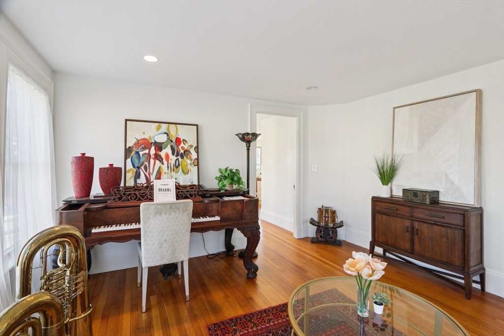 35 Frances Street Melrose, MA 02176 - Photo 7 of 42 a view of a livingroom with furniture and a flat screen tv
