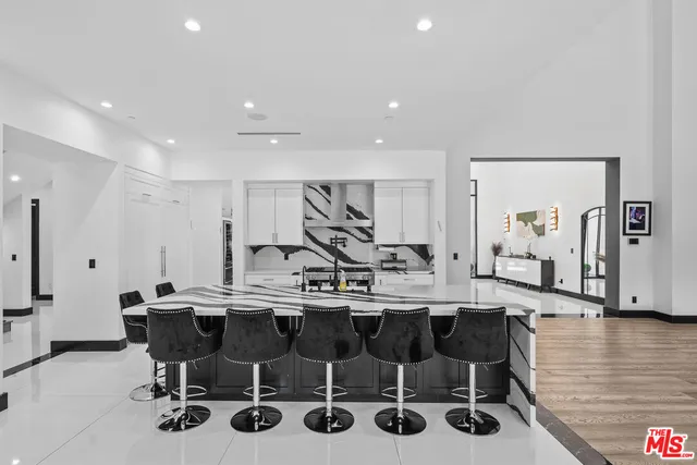 a room with furniture and a large window