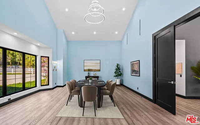 a view of a backyard with sitting area