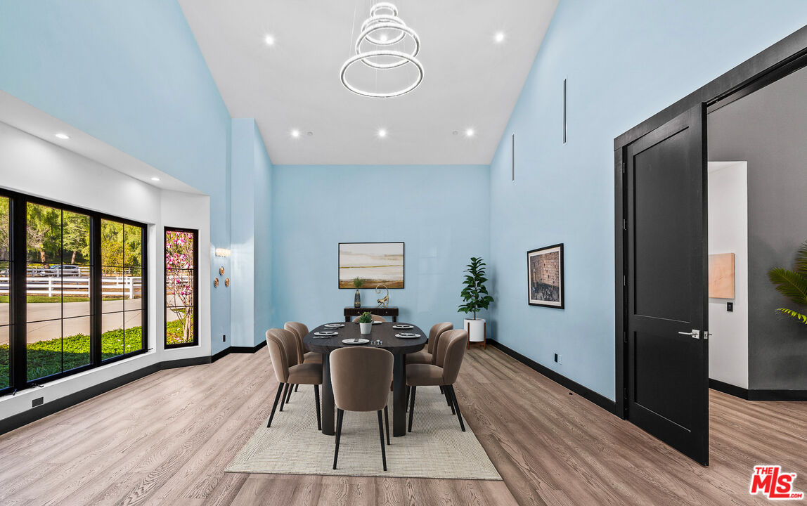 6006 Spring Valley Road Hidden Hills, CA 91302 - Photo 7 of 31 a view of a livingroom with furniture window and wooden floor
