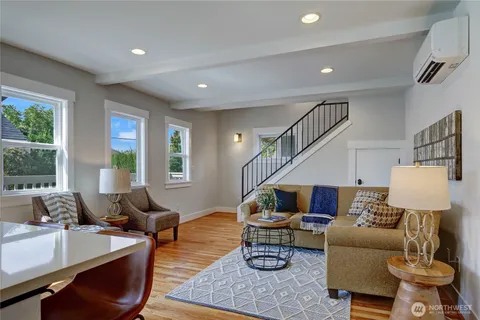 a living room with furniture and a table
