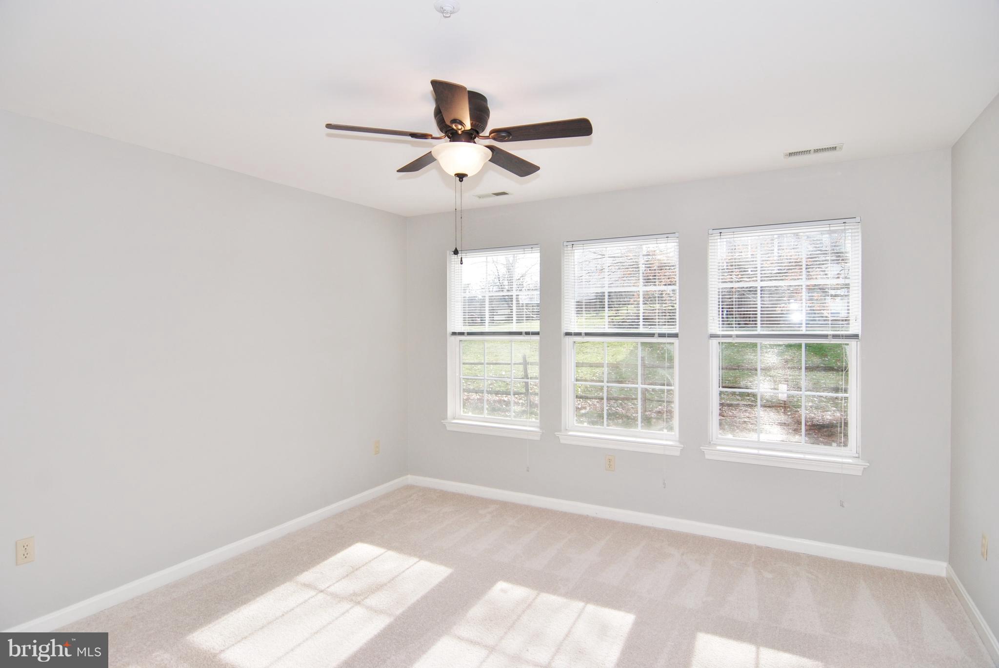 2402 Dominion Drive, Unit 2C Frederick, MD 21702 - Photo 18 of 34 The 2nd bedroom has new carpet and paint and fan!