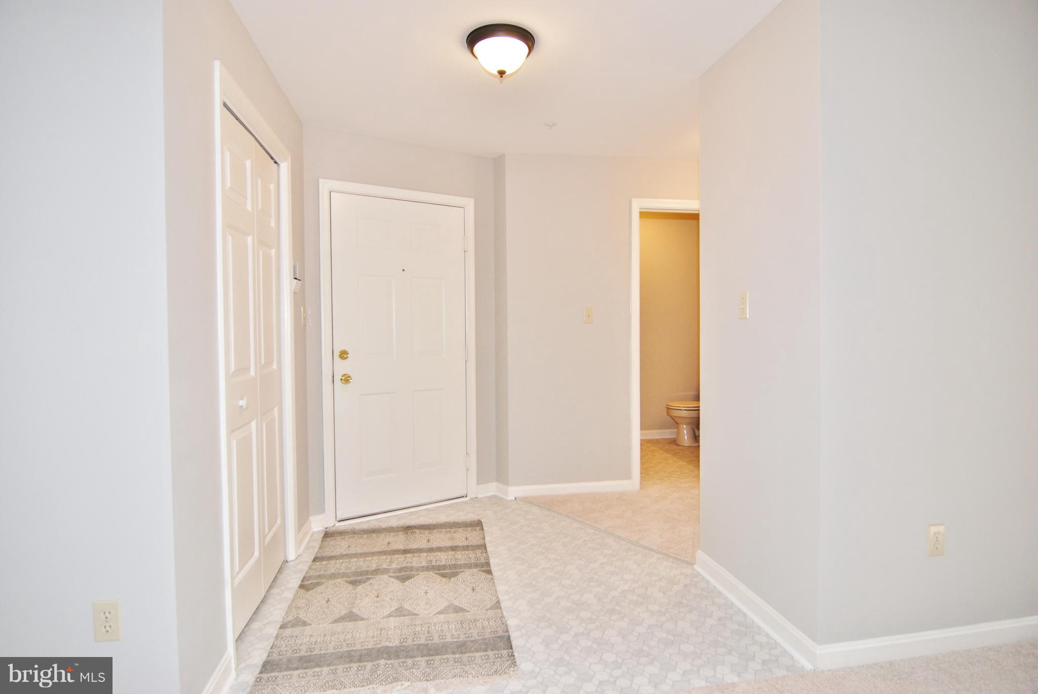 2402 Dominion Drive, Unit 2C Frederick, MD 21702 - Photo 20 of 34 There is a large foyer and coat closet.
