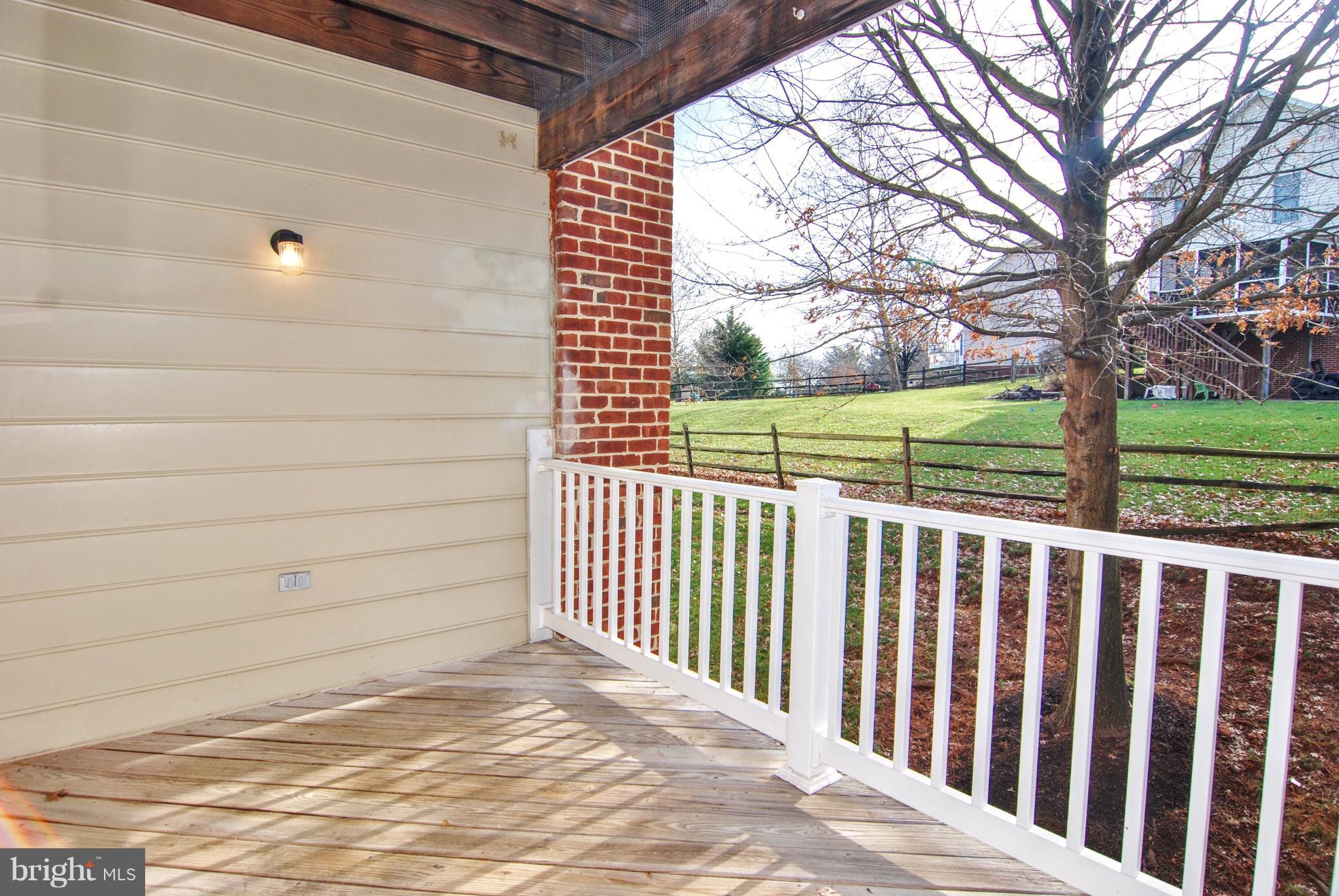 2402 Dominion Drive, Unit 2C Frederick, MD 21702 - Photo 21 of 34 And a private deck on the rear of the building.
