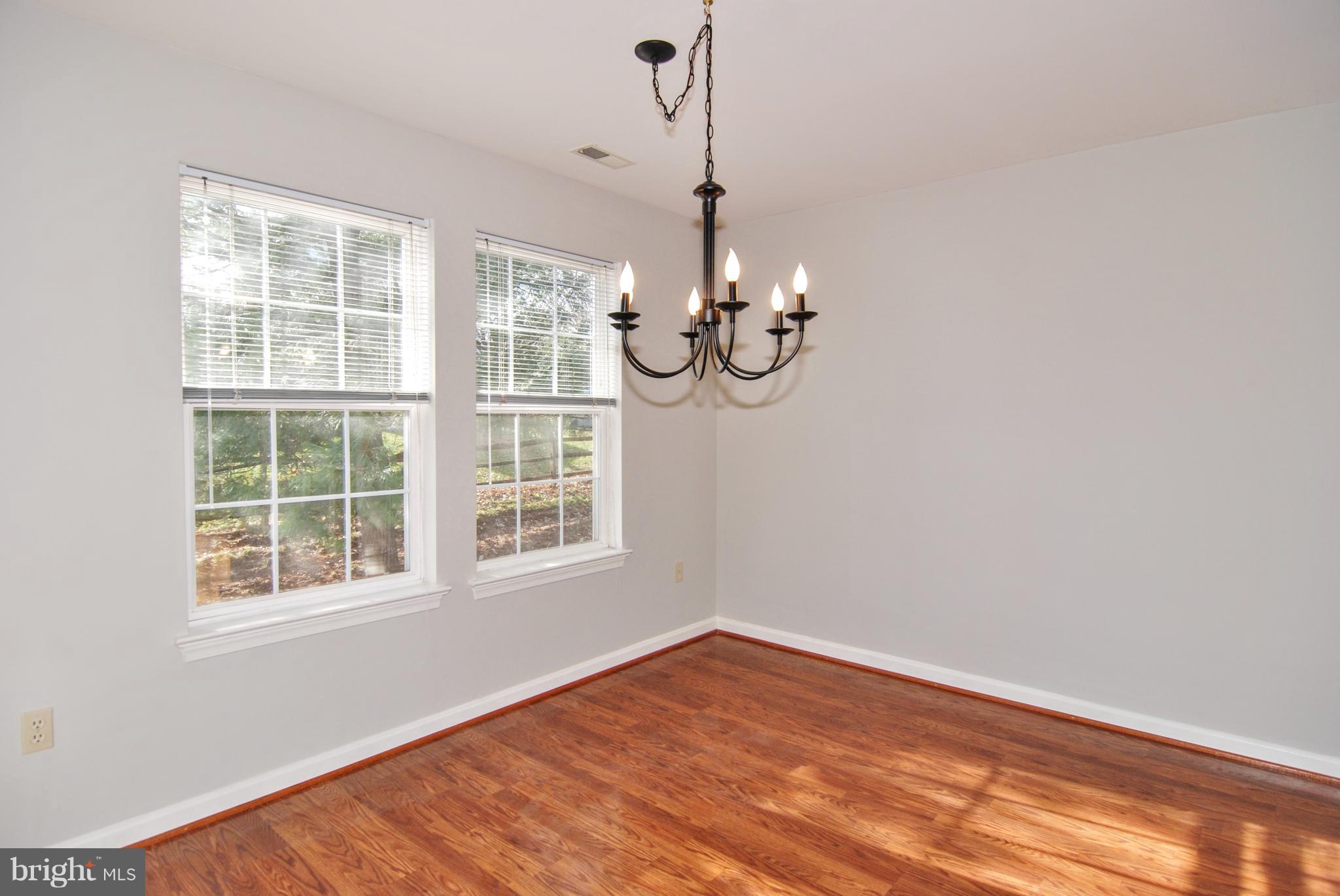 2402 Dominion Drive, Unit 2C Frederick, MD 21702 - Photo 4 of 34 Fresh paint, new fixtures and ceiling fans.