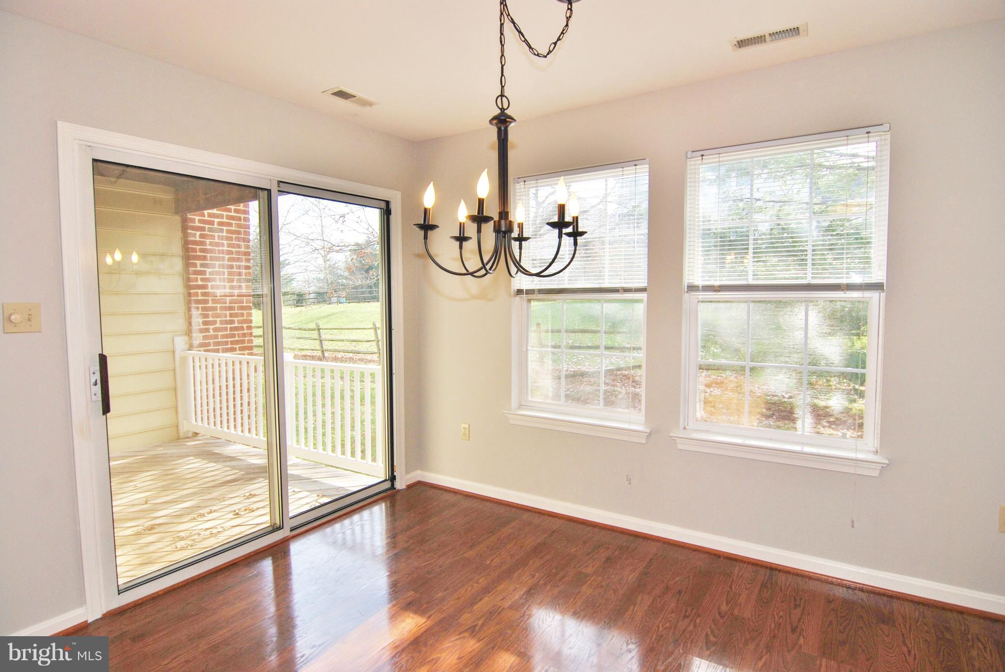 2402 Dominion Drive, Unit 2C Frederick, MD 21702 - Photo 5 of 34 The dining room and kitchen floors are newer.