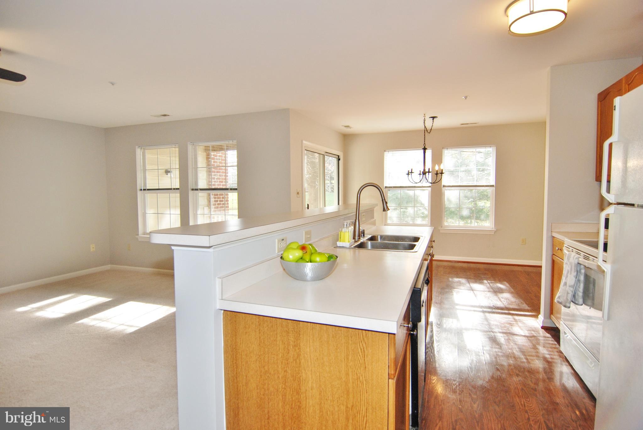 2402 Dominion Drive, Unit 2C Frederick, MD 21702 - Photo 7 of 34 The kitchen is the center of condo with..