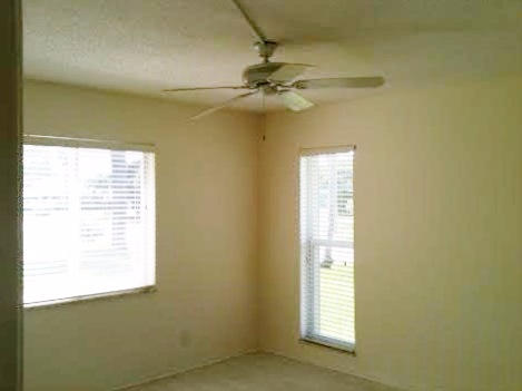 2721 Southwest 15th Street, Unit 104 Delray Beach, FL 33445 - Photo 5 of 6 Master bedroom