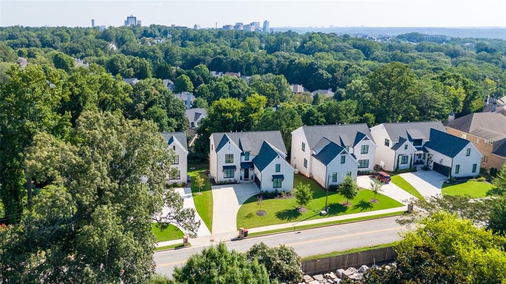 4097 Gilmore Road Southeast Smyrna, GA 30080 - Photo 2 of 26 an aerial view of residential houses with outdoor space and street view