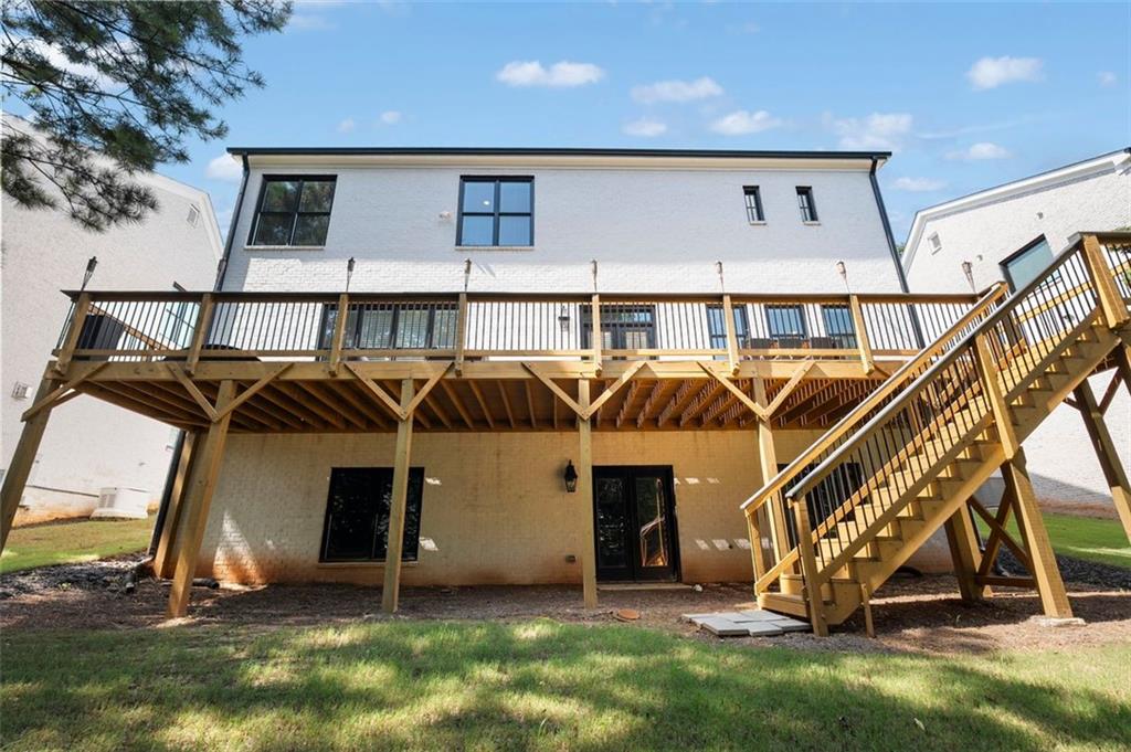 4097 Gilmore Road Southeast Smyrna, GA 30080 - Photo 25 of 26 a view of a house with a yard