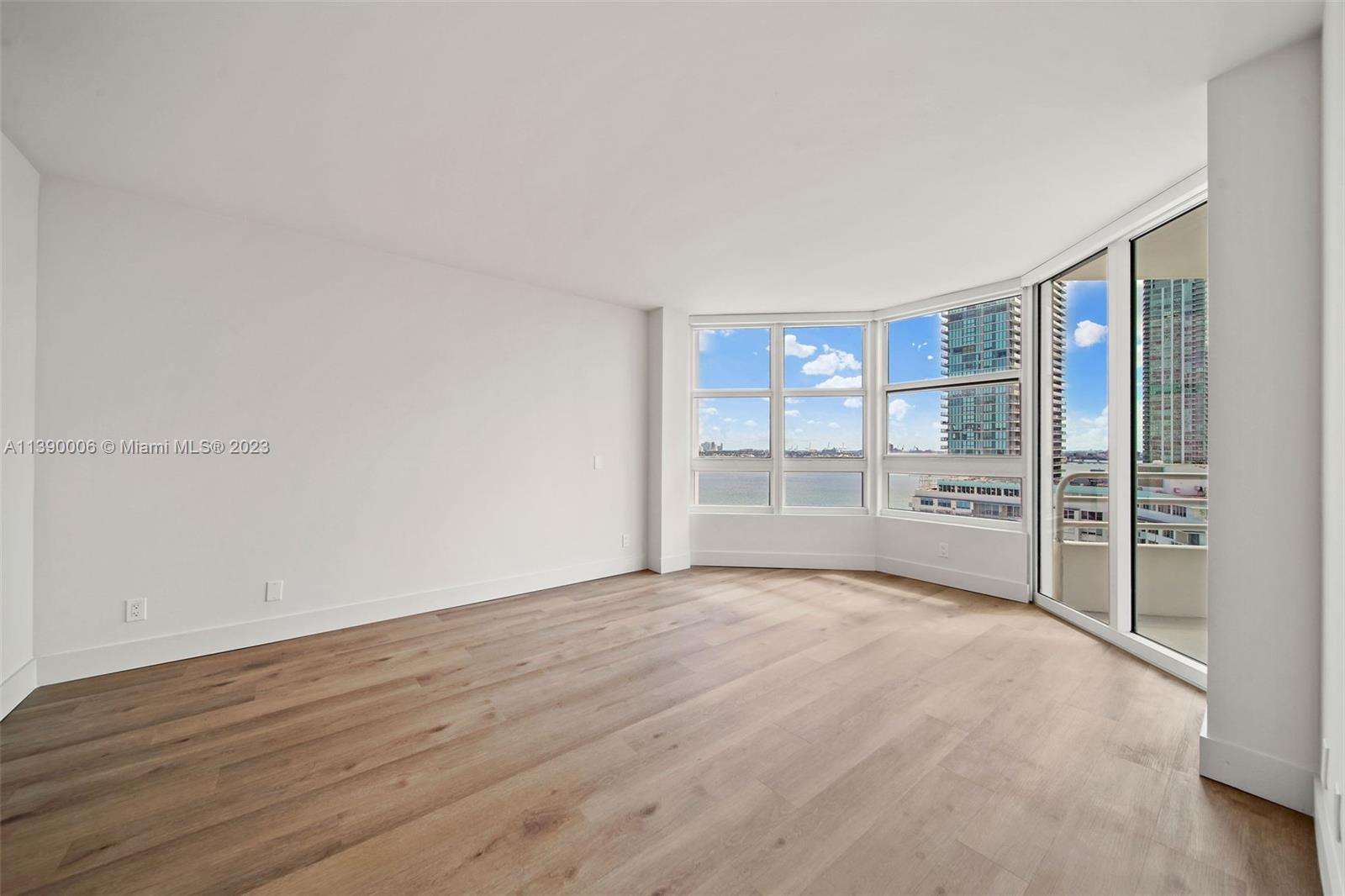 555 Northeast 34th Street, Unit 2307 Miami, FL 33137 - Photo 22 of 63 a view of an empty room with a window