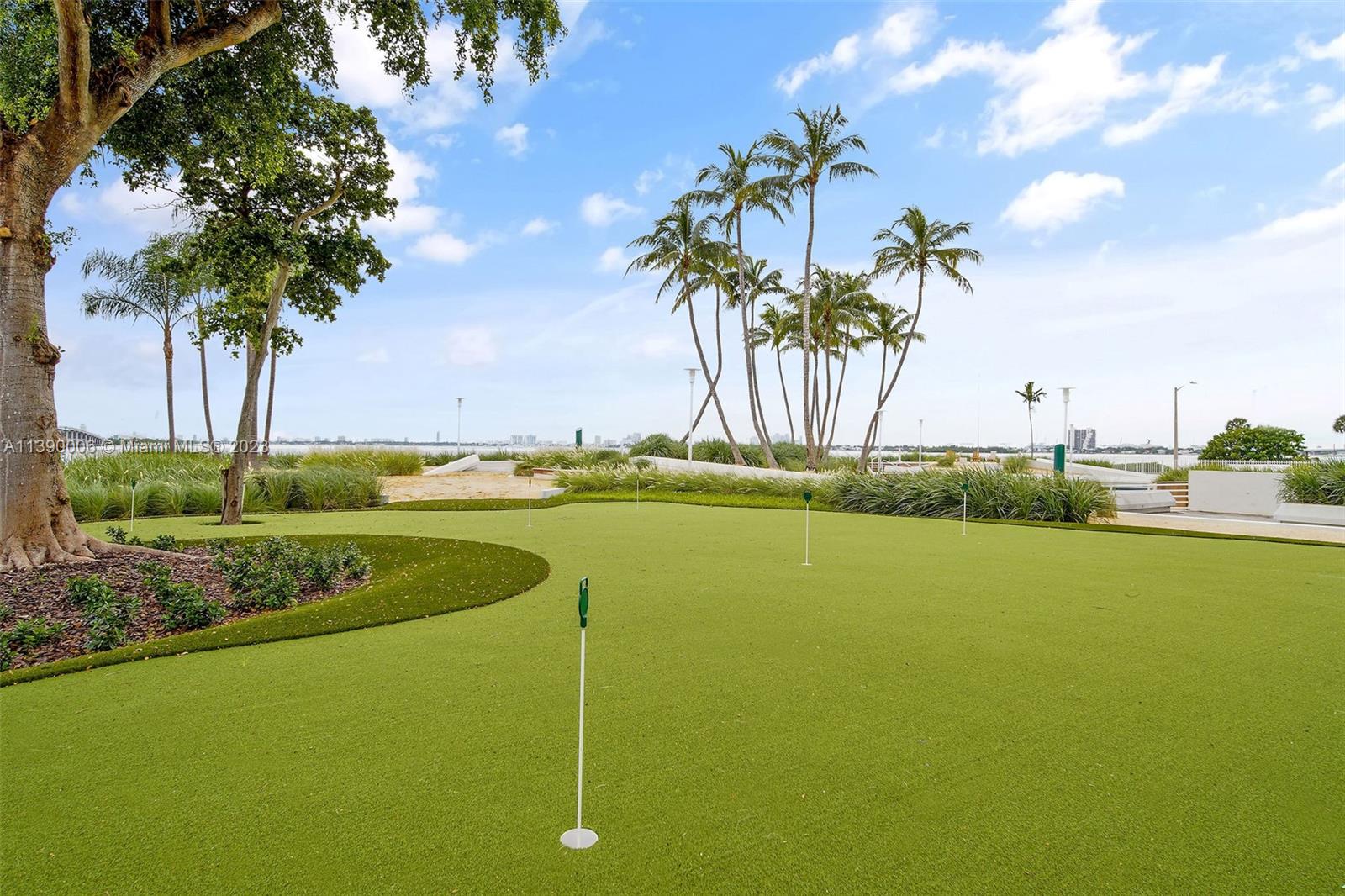 555 Northeast 34th Street, Unit 2307 Miami, FL 33137 - Photo 58 of 63 a view of a swimming pool and an outdoor space