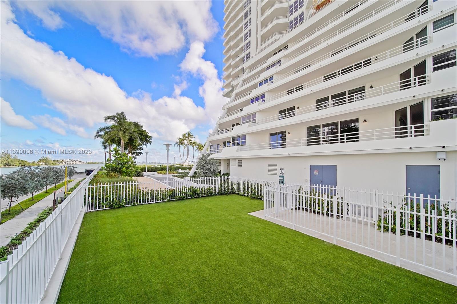 555 Northeast 34th Street, Unit 2307 Miami, FL 33137 - Photo 61 of 63 a view of a house with backyard and sitting area