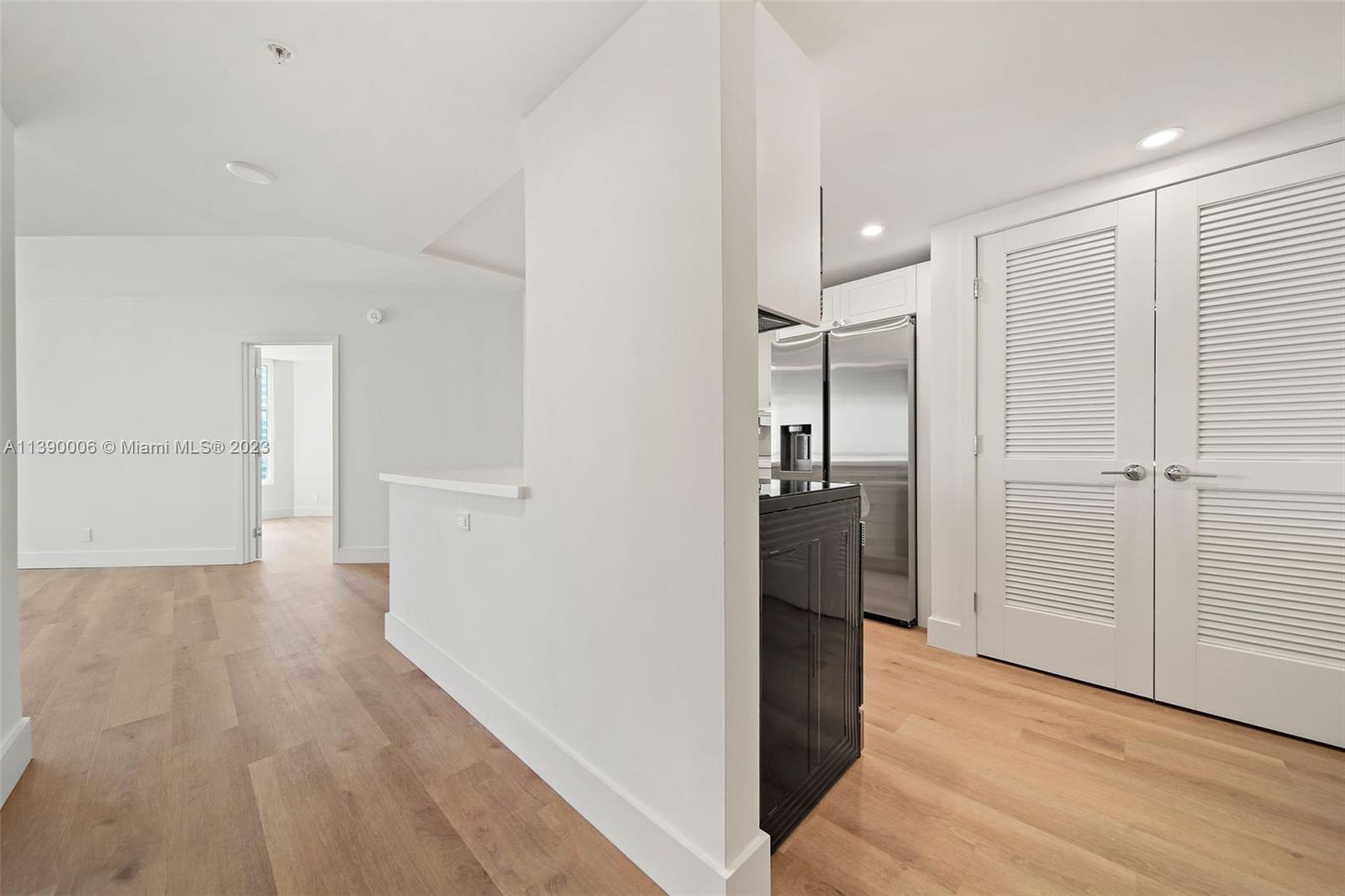 555 Northeast 34th Street, Unit 2307 Miami, FL 33137 - Photo 7 of 63 a view of a hallway with wooden floor