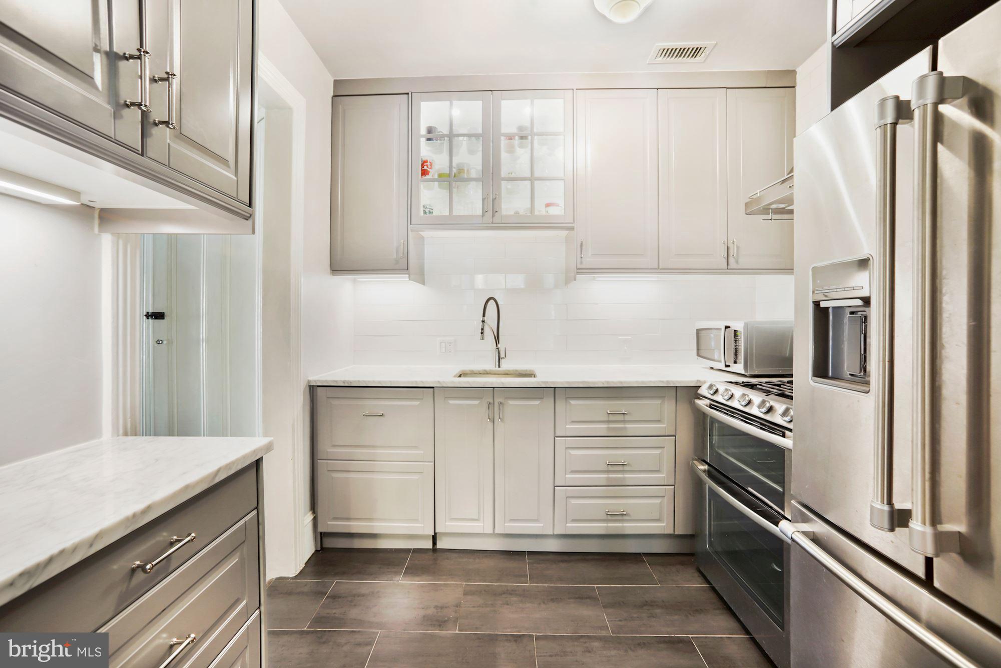Copious cabinets and counters