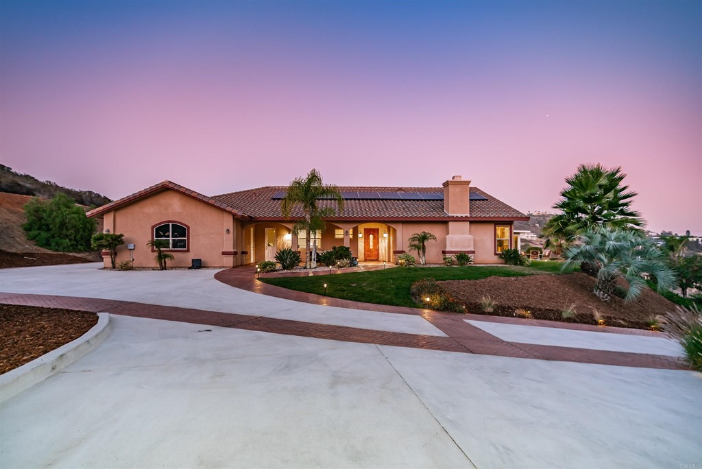 3642 Emma Road Vista, CA 92084 - Photo 1 of 1 a front view of a house with a yard and garage