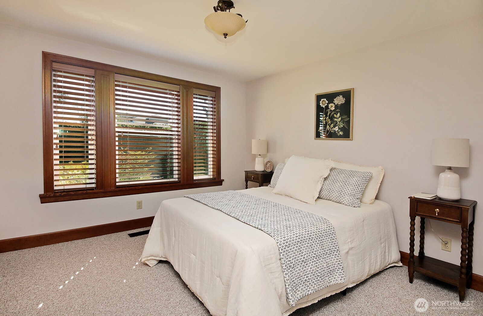 2471 Soundview Drive Langley, WA 98260 - Photo 19 of 38 a bedroom with a bed and a window
