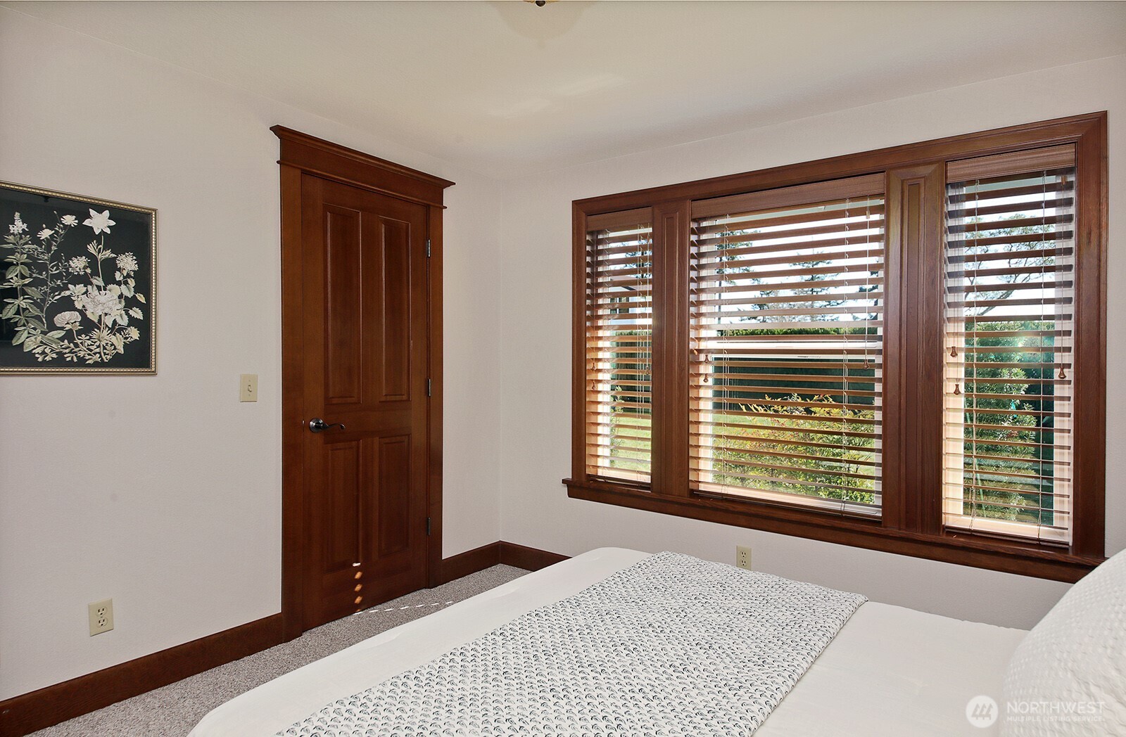 2471 Soundview Drive Langley, WA 98260 - Photo 20 of 38 a bedroom with a bed and a window