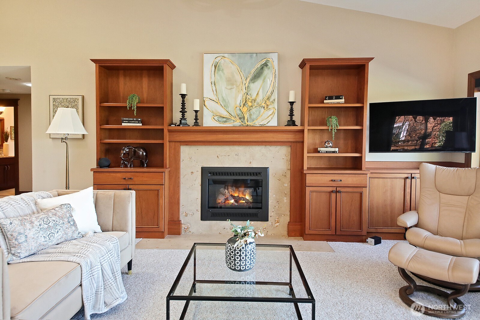 2471 Soundview Drive Langley, WA 98260 - Photo 2 of 38 a living room with furniture a flat screen tv and a fireplace
