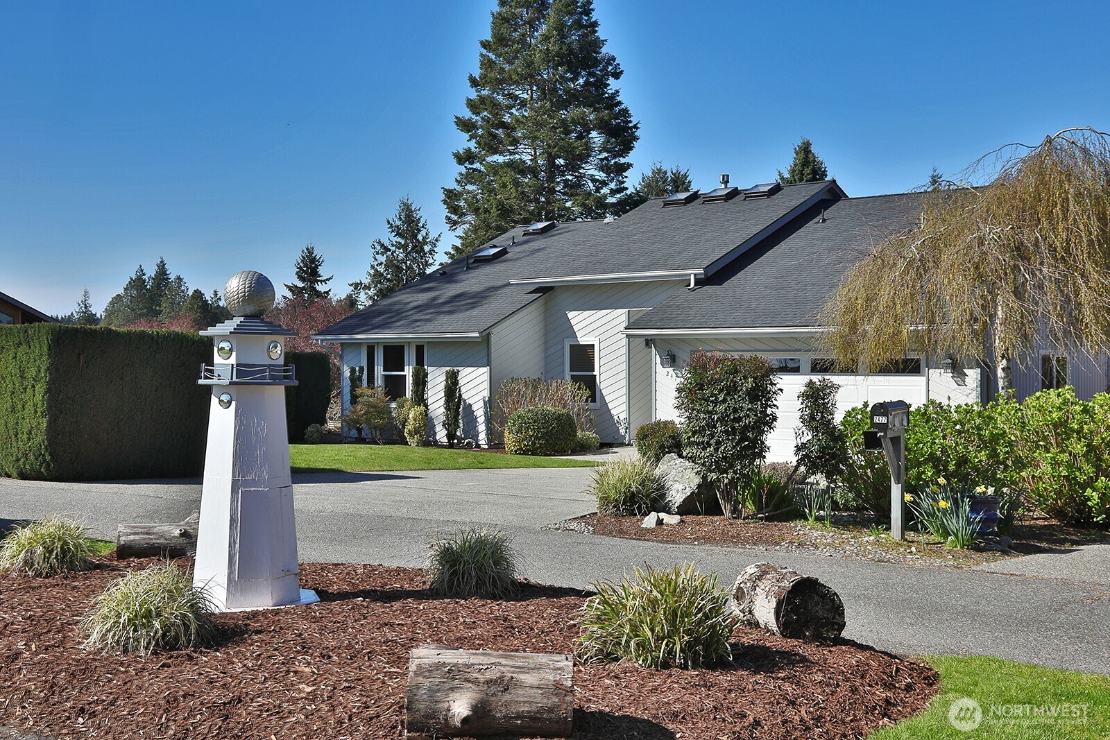 2471 Soundview Drive Langley, WA 98260 - Photo 23 of 38 a front view of a house with a yard