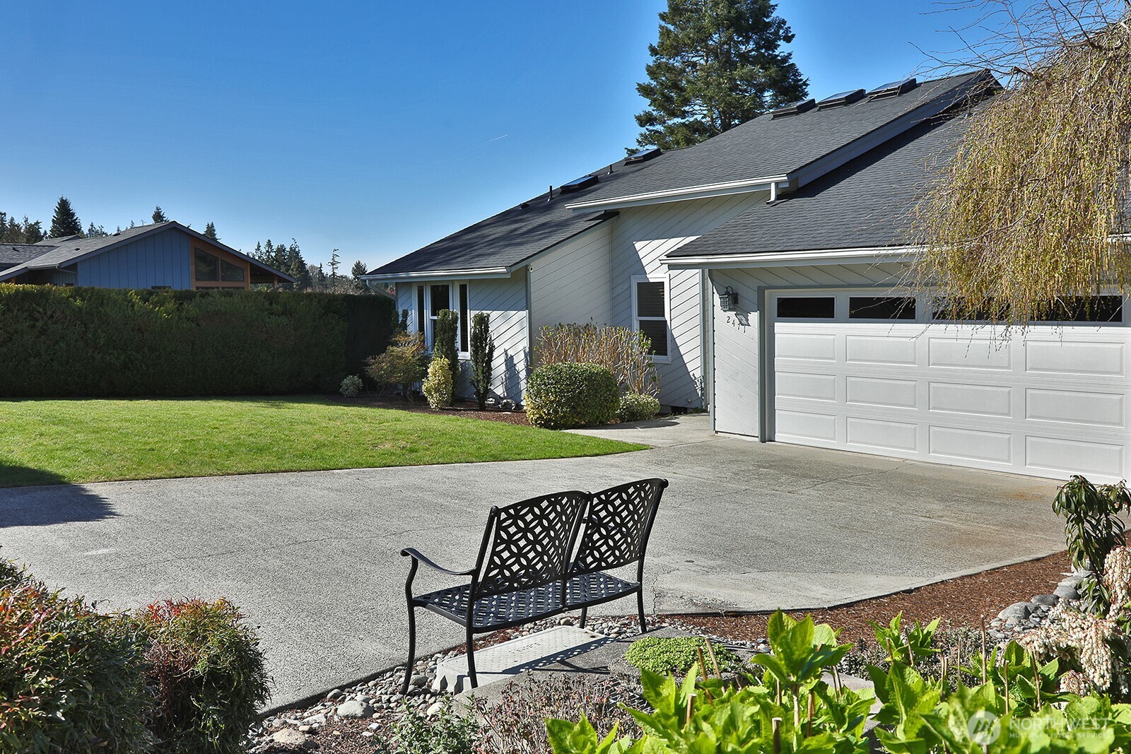 2471 Soundview Drive Langley, WA 98260 - Photo 24 of 38 a view of a house with backyard and garden