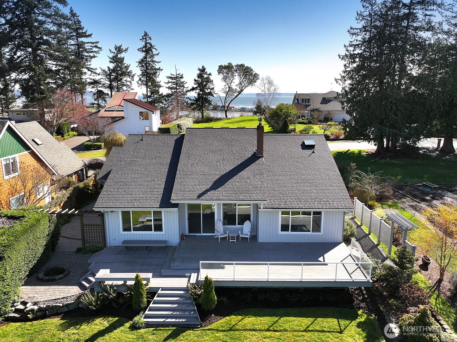 2471 Soundview Drive Langley, WA 98260 - Photo 25 of 38 a aerial view of a house with swimming pool and a yard