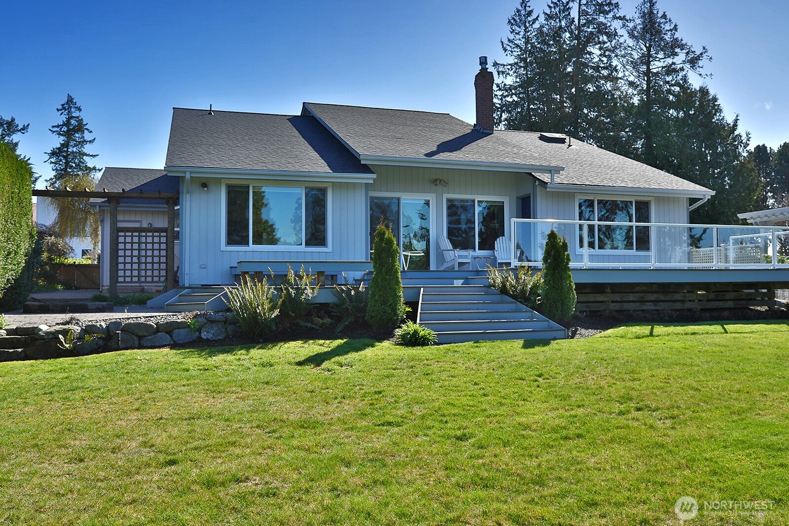 2471 Soundview Drive Langley, WA 98260 - Photo 26 of 38 a front view of a house with a yard