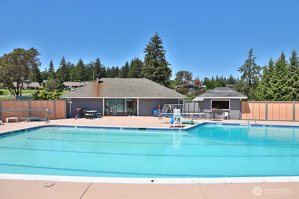 2471 Soundview Drive Langley, WA 98260 - Photo 34 of 38 a front view of a house with a garden and yard
