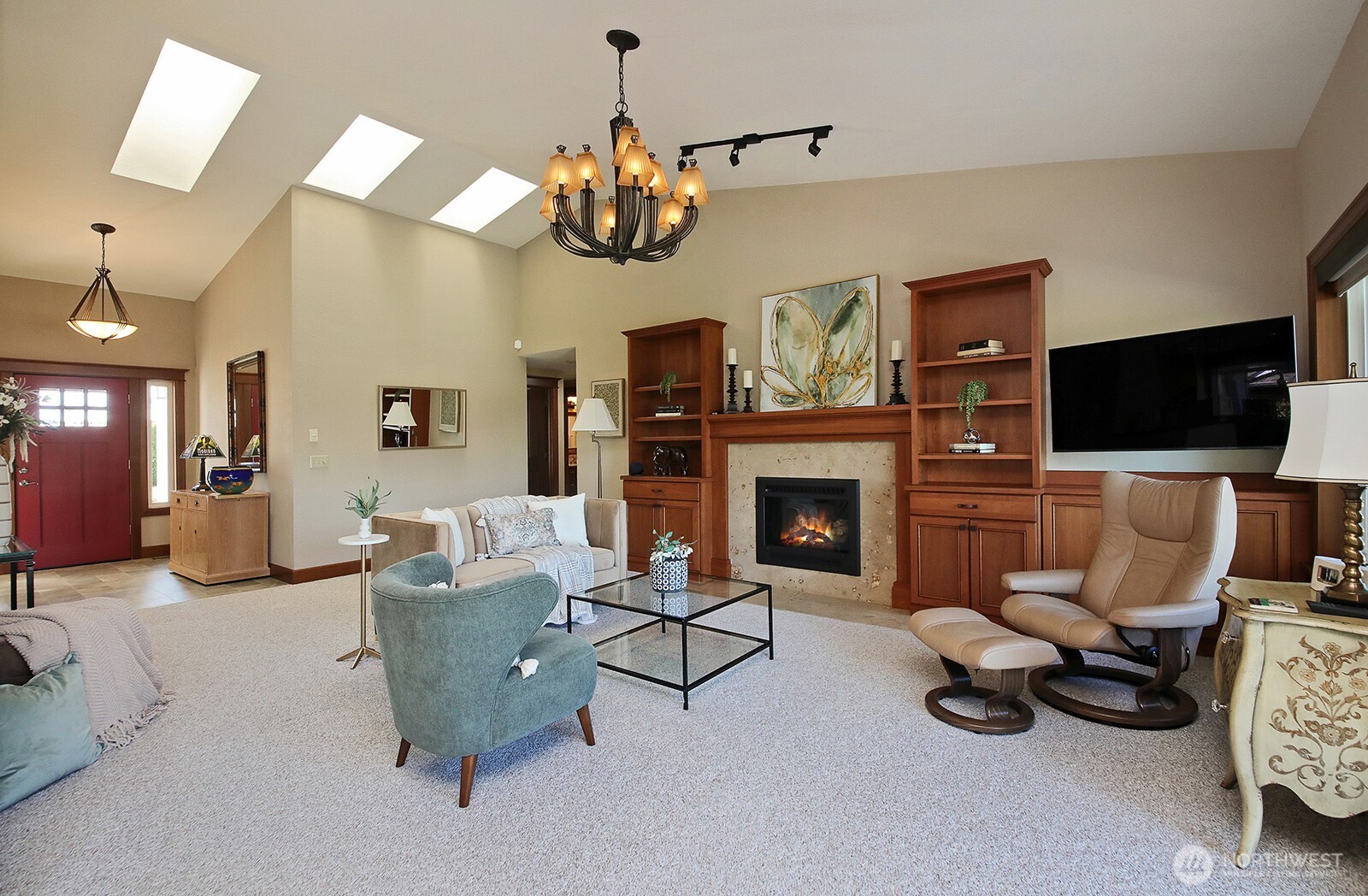 2471 Soundview Drive Langley, WA 98260 - Photo 5 of 38 a living room with furniture chandelier and a flat screen tv