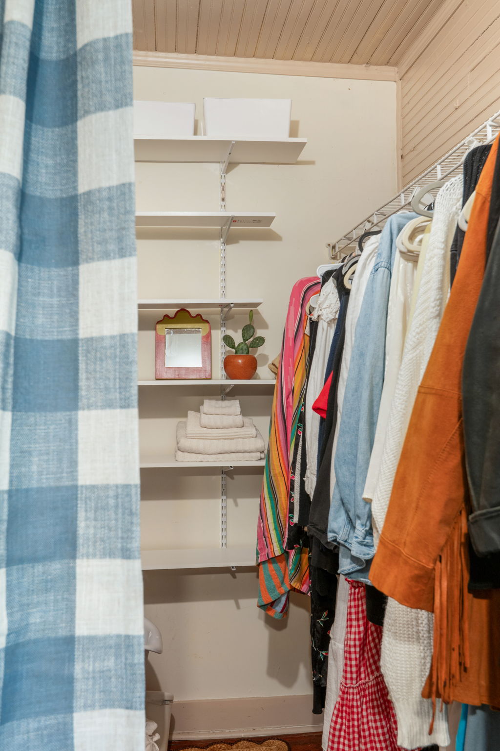 17919 Manda Carlson Road Coupland, TX 78615 - Photo 24 of 40 a view of walk in closet with clothes and shoes