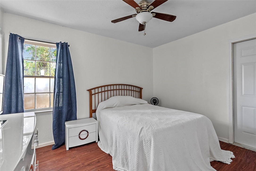 481 Warren Street Sebastian, FL 32958 - Photo 16 of 33 a bedroom with a bed and a window