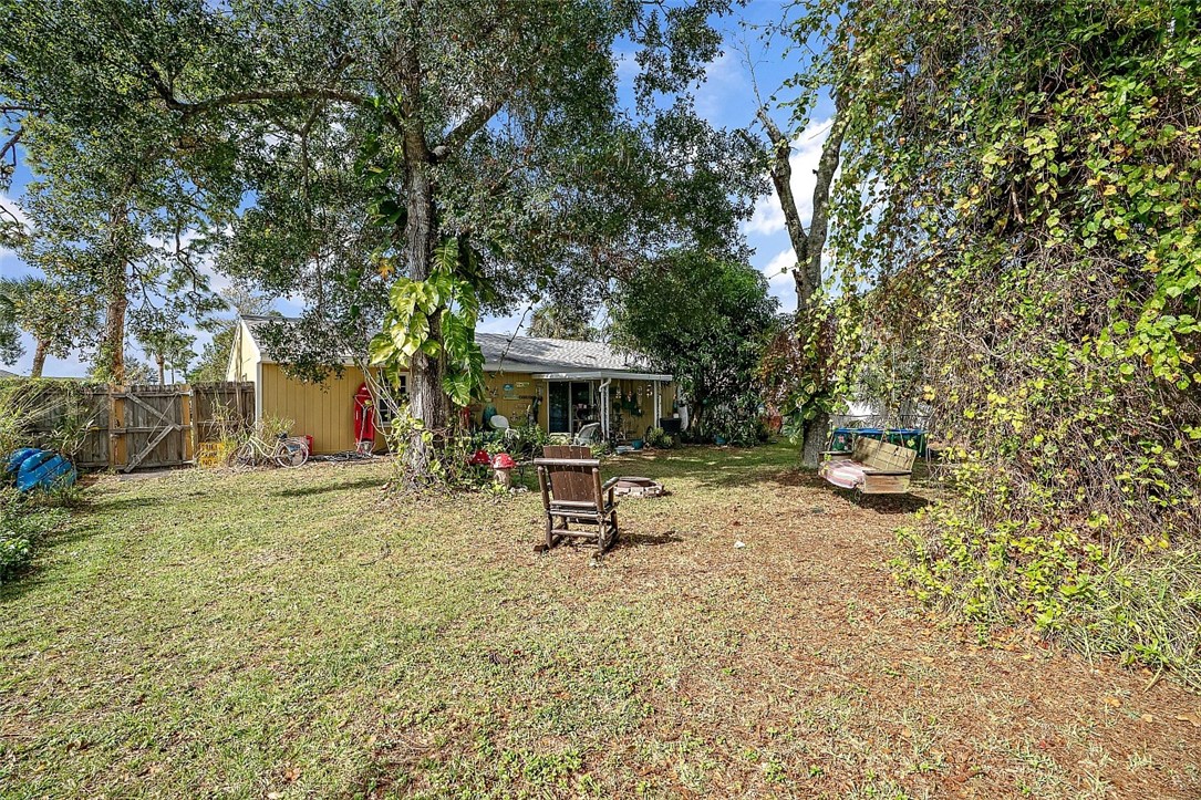 481 Warren Street Sebastian, FL 32958 - Photo 28 of 33 a view of a bench in a backyard