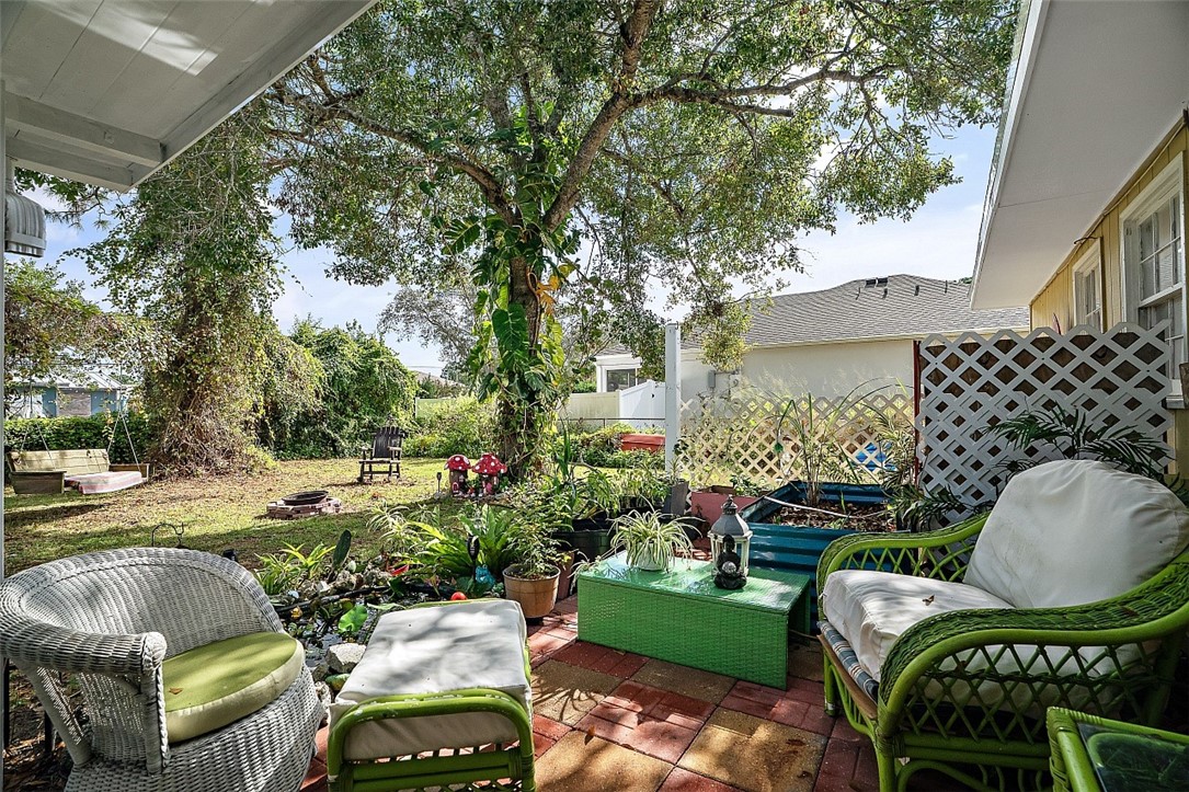 481 Warren Street Sebastian, FL 32958 - Photo 7 of 33 a view of backyard with outdoor seating and green space