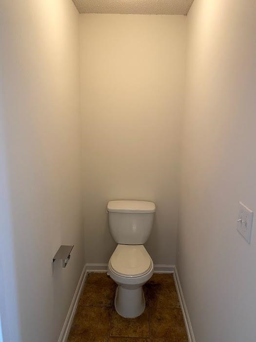 1630 Tigris Court Atlanta, GA 30349 - Photo 28 of 33 a bathroom with a toilet