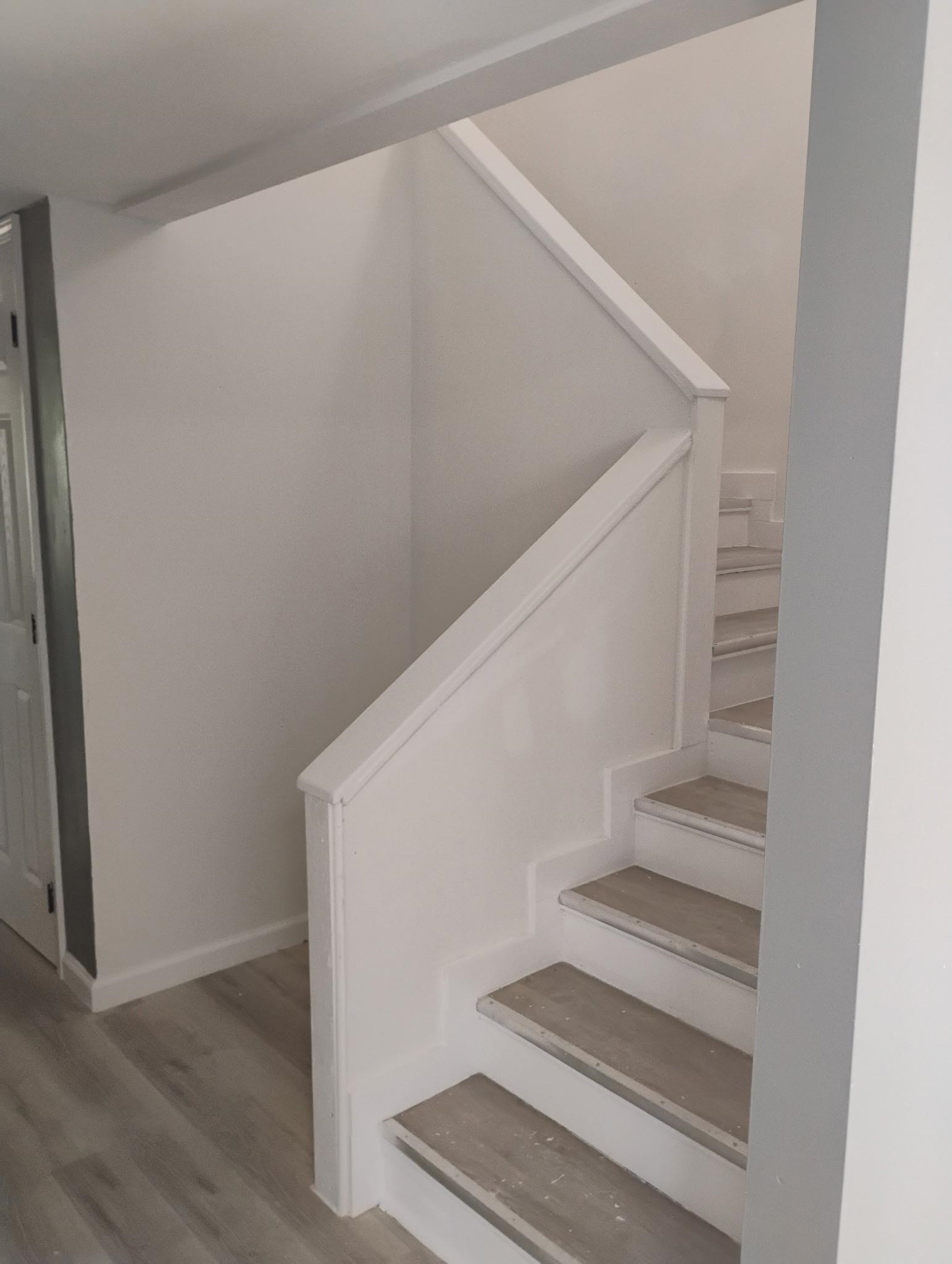 3340 Kirby Trees Place, Unit 3340 Memphis, TN 38115 - Photo 6 of 16 Staircase with wood finished floors and baseboards