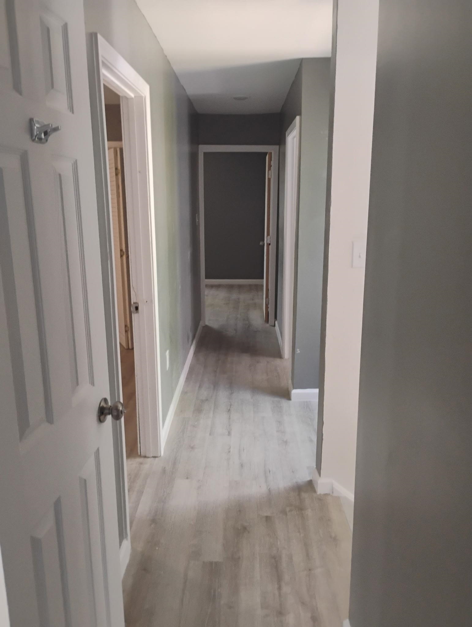 3340 Kirby Trees Place, Unit 3340 Memphis, TN 38115 - Photo 8 of 16 Hall featuring baseboards and light wood-style floors