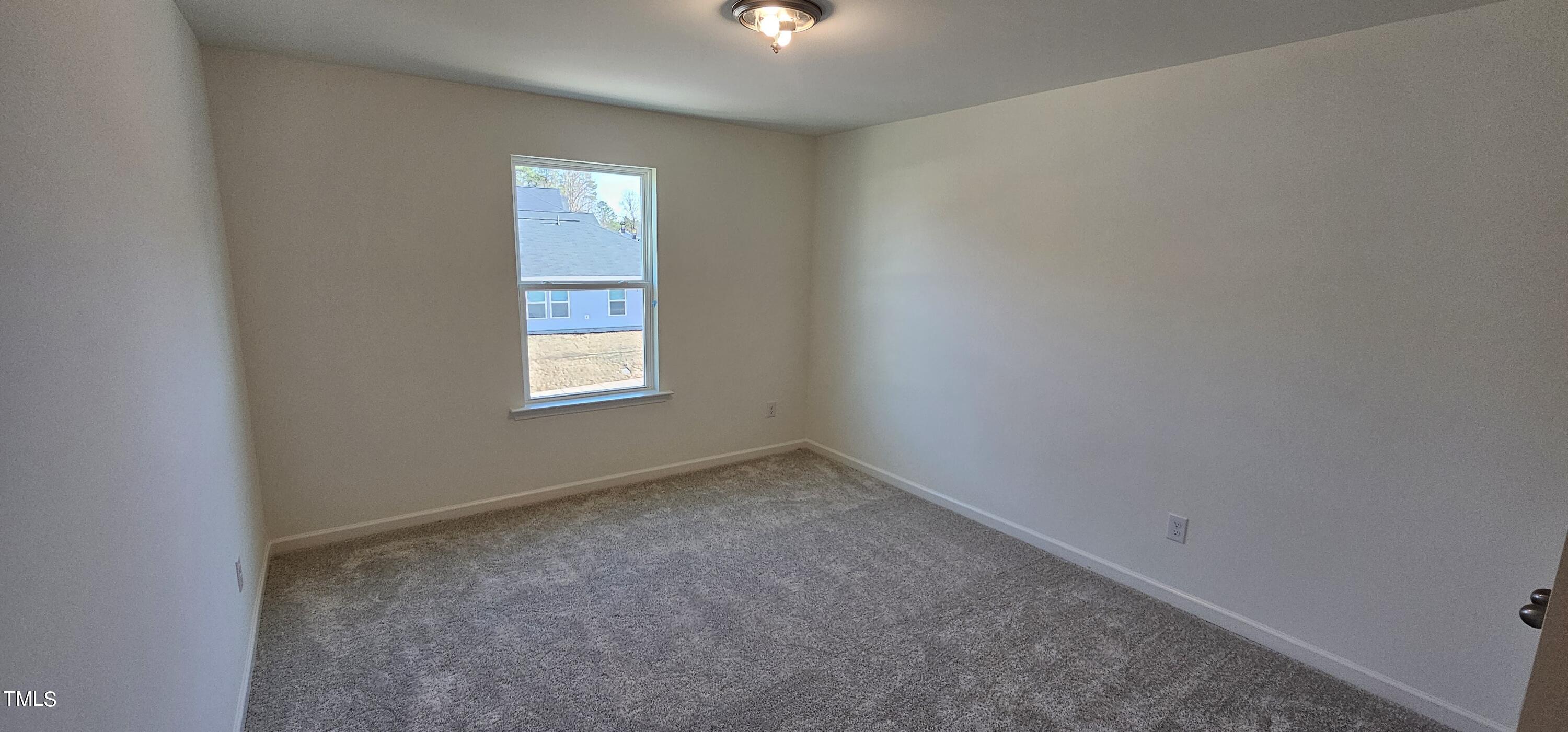 1409 Underbrush Drive Durham, NC 27703 - Photo 11 of 21 an empty room with windows and closet